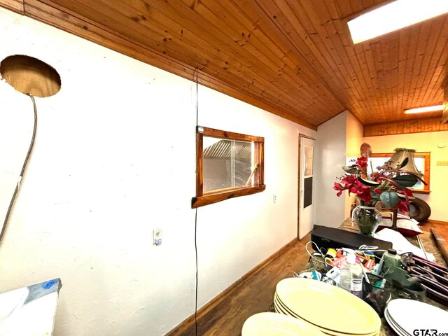 bathroom featuring toilet, wood-type flooring, vaulted ceiling, and wooden ceiling