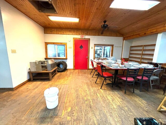 dining area with hardwood / wood-style flooring, ceiling fan, lofted ceiling, and wood ceiling