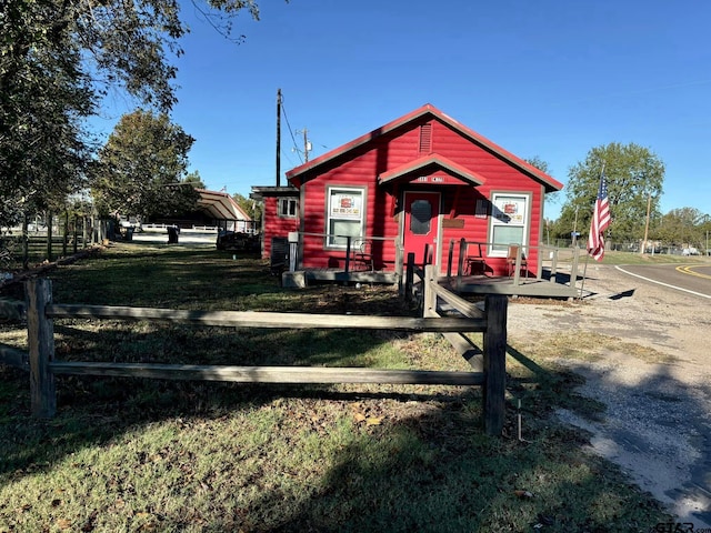 view of outdoor structure with a yard