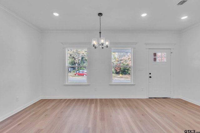 1410 W Connally St, Tyler, TX 75701 - foyer with light wood-type flooring, a chandelier, ornamental molding, and recessed lighting