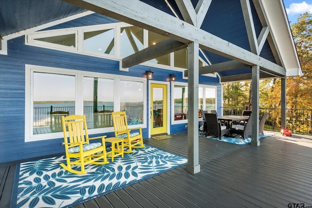 deck featuring outdoor dining area