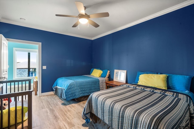 bedroom with ornamental molding, a ceiling fan, light wood finished floors, and baseboards