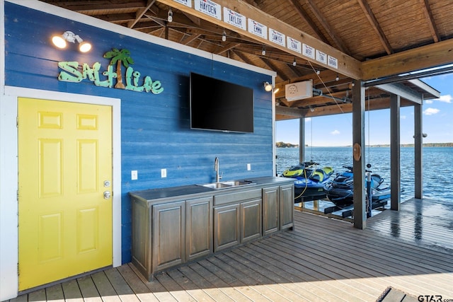 dock area with boat lift and a sink