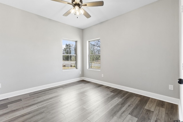 unfurnished room featuring ceiling fan and wood-type flooring