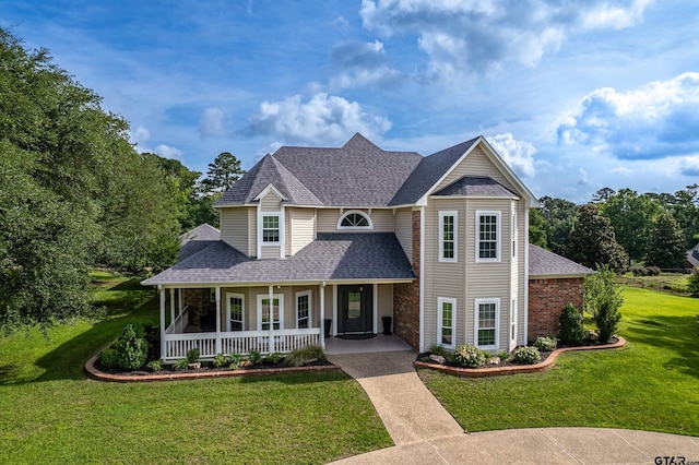 1881 Valley Vw, Tyler, TX 75701 - traditional-style house featuring covered porch, a front lawn, and roof with shingles