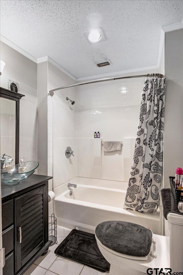bathroom with toilet, crown molding, shower / tub combo with curtain, and a textured ceiling