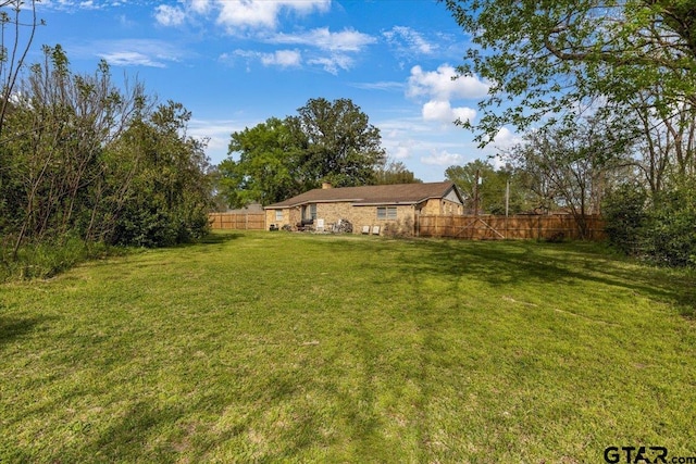 view of yard featuring fence