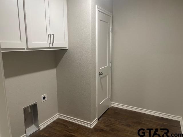 110 Alpine Dr, Tyler, TX 75701 - laundry room with electric dryer hookup, dark wood-style flooring, and cabinet space