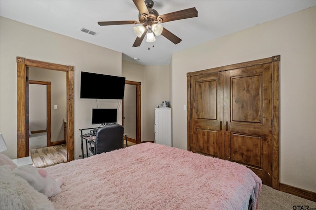 bedroom featuring ceiling fan and carpet floors