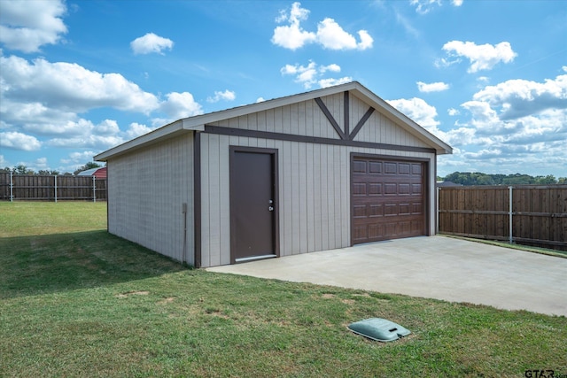 garage with a lawn