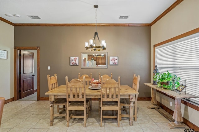 tiled dining space with ornamental molding and an inviting chandelier