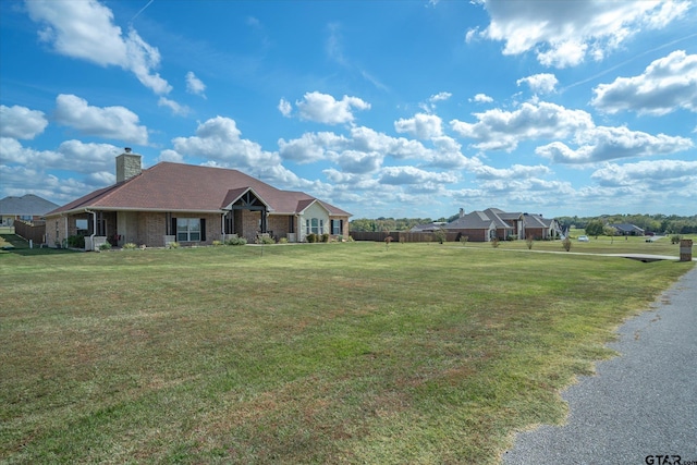 view of front of home with a front lawn