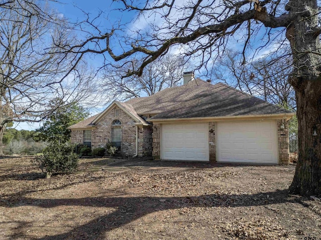 ranch-style home with a garage