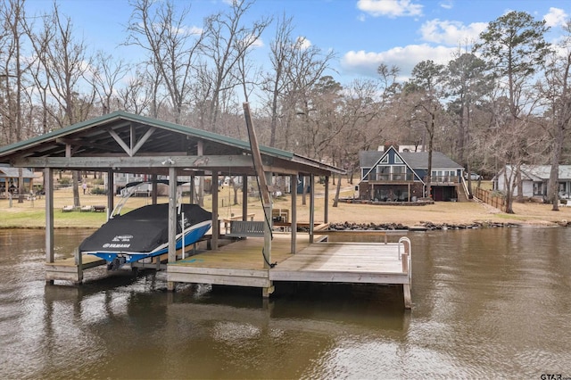 view of dock featuring stairway, a water view, and boat lift