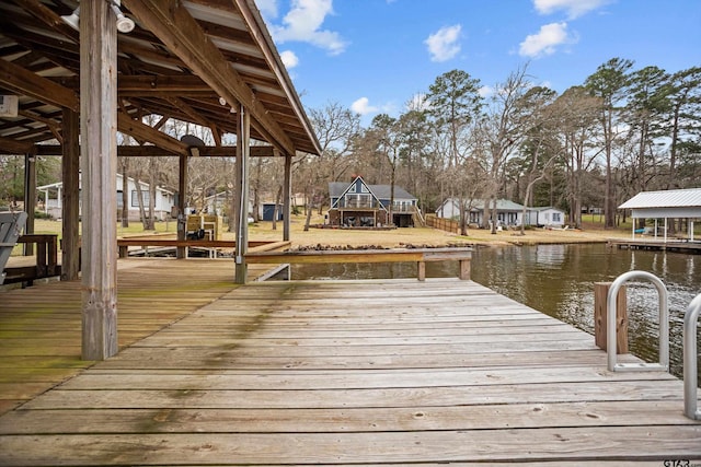 dock area featuring a water view