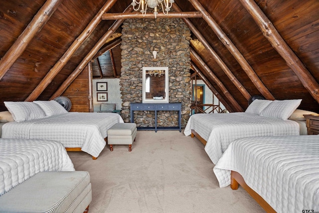 bedroom with wooden ceiling, vaulted ceiling with beams, and carpet