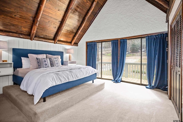 carpeted bedroom featuring high vaulted ceiling, beamed ceiling, wood ceiling, and access to outside