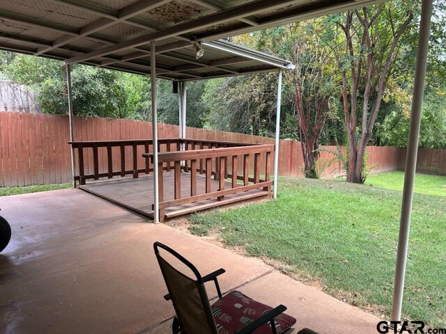 view of patio with a wooden deck