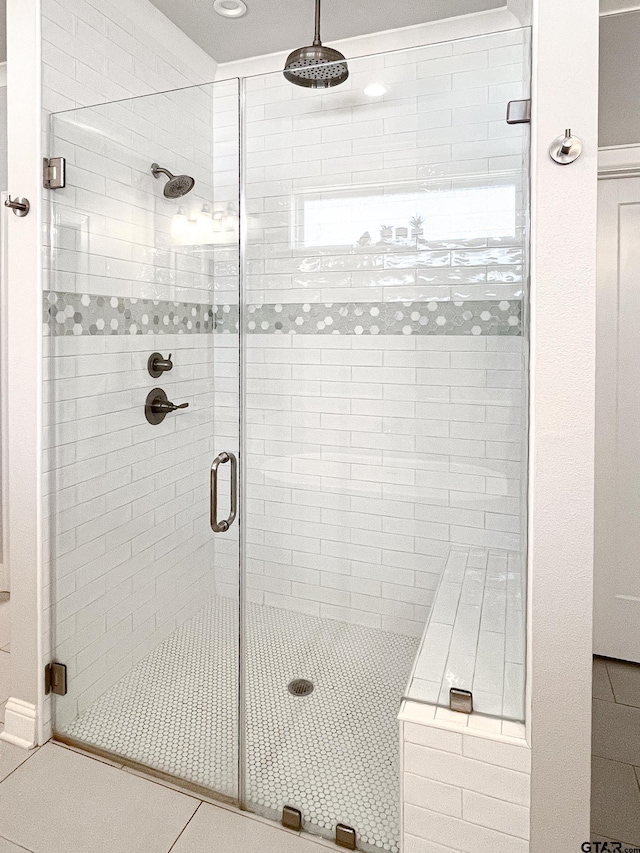 9035 Shallow Cv, Tyler, TX 75703 - bathroom featuring a shower stall and tile patterned flooring
