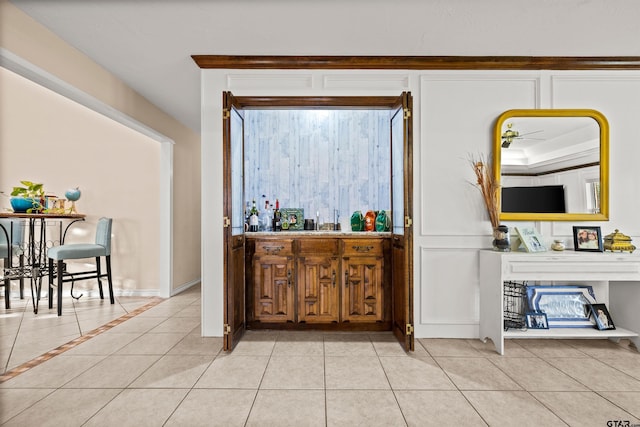 bar with light tile patterned floors