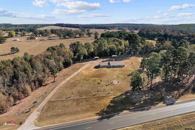 birds eye view of property featuring a rural view