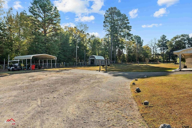 view of road with driveway