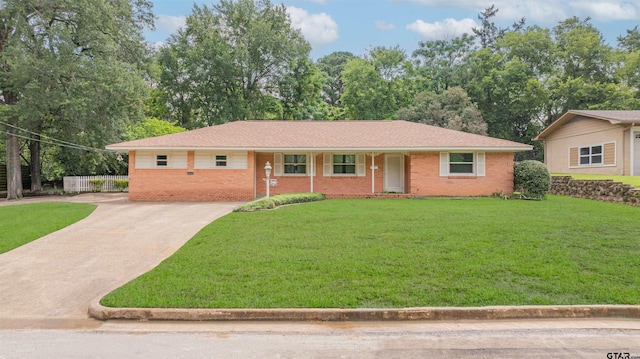 2504 Pounds Ave, Tyler, TX 75701 - ranch-style home with concrete driveway and brick siding