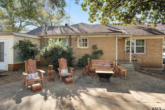 rear view of property with a patio area