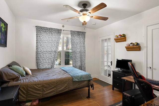 bedroom featuring ceiling fan and dark hardwood / wood-style flooring