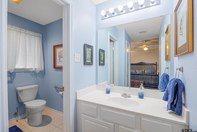 5401 Hollytree Dr, Tyler, TX 75703 - bathroom featuring vanity, tile patterned floors, and a ceiling fan