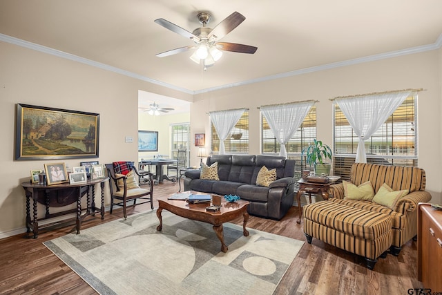 5401 Hollytree Dr, Tyler, TX 75703 - living room with ceiling fan, crown molding, wood finished floors, and healthy amount of natural light