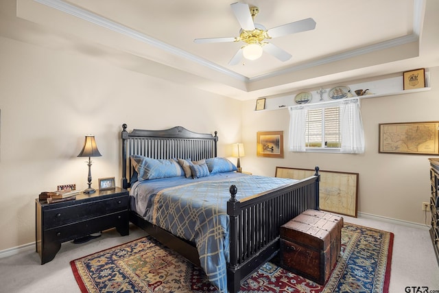 5401 Hollytree Dr, Tyler, TX 75703 - carpeted bedroom featuring ornamental molding, a tray ceiling, and ceiling fan