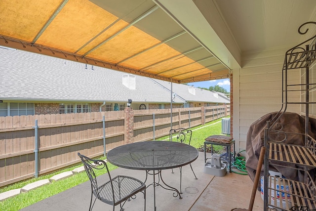 5401 Hollytree Dr, Tyler, TX 75703 - fenced backyard with a patio area and outdoor dining area