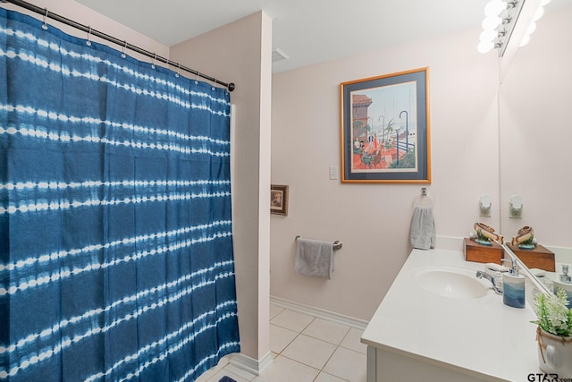 5401 Hollytree Dr, Tyler, TX 75703 - bathroom with tile patterned floors, vanity, and curtained shower