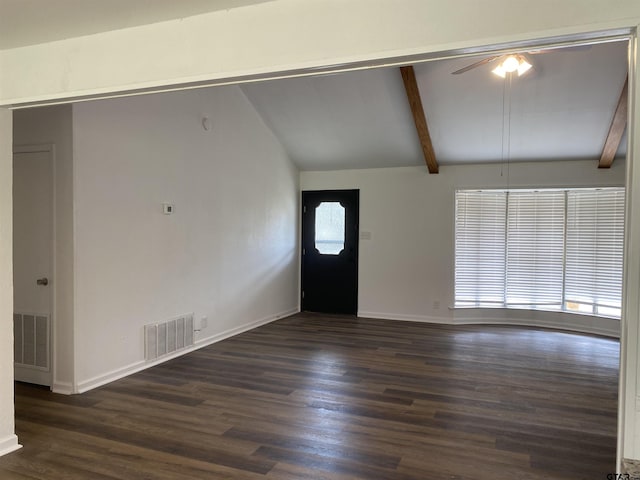 foyer entrance with vaulted ceiling with beams and dark hardwood / wood-style floors