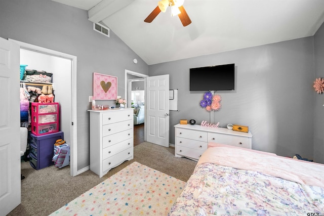 carpeted bedroom with a ceiling fan, visible vents, and vaulted ceiling with beams