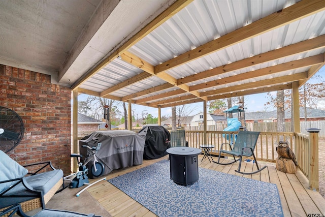 deck with fence and grilling area
