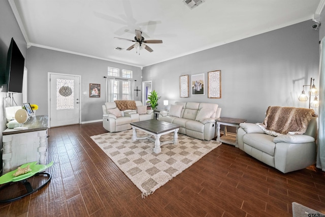 living room with crown molding, a ceiling fan, visible vents, and dark wood-style flooring