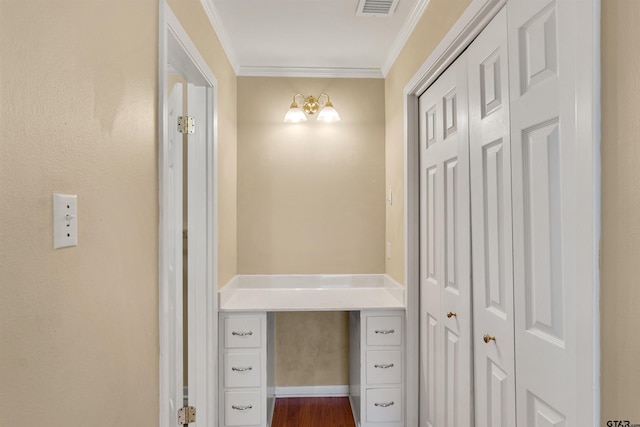 interior space with dark wood-type flooring and crown molding