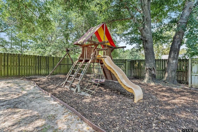 view of jungle gym featuring a fenced backyard