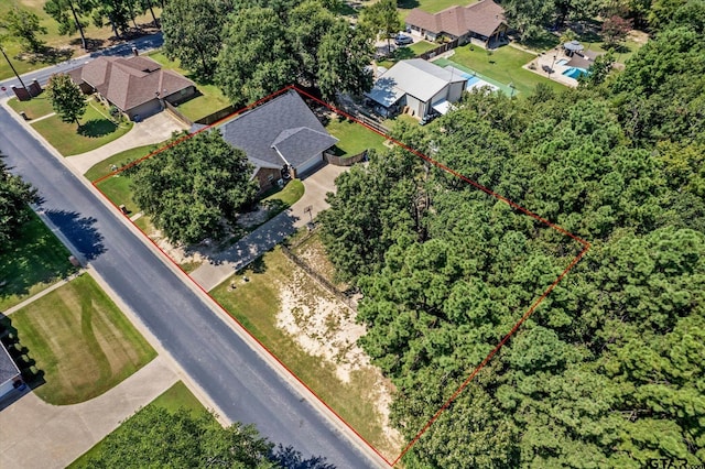 birds eye view of property with a residential view