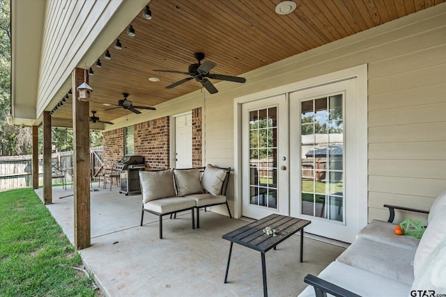 view of patio with a ceiling fan, a grill, and fence