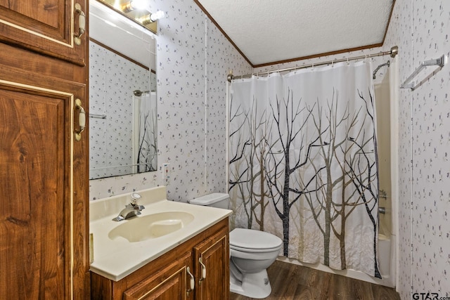 364 San Saba Ln, Mount Vernon, TX 75457 - bathroom featuring shower / bath combination with curtain, a textured ceiling, wallpapered walls, and wood finished floors