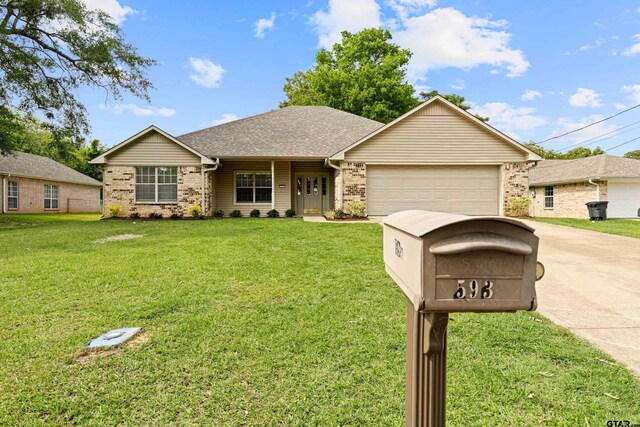 593 Briarwood Dr, Gladewater, TX 75647 - ranch-style house with an attached garage, driveway, a front yard, brick siding, and a shingled roof