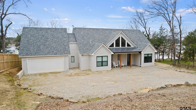 modern farmhouse style home featuring a garage