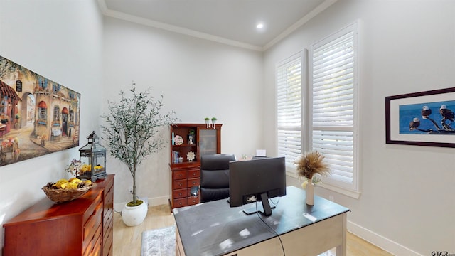 office area with light hardwood / wood-style floors and crown molding