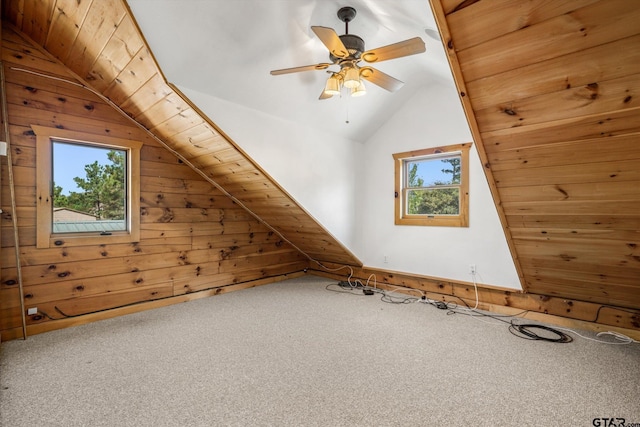 11698 Piper Ln, Frankston, TX 75763 - bonus room with lofted ceiling, wood walls, carpet floors, and ceiling fan