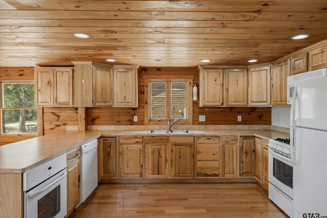 11698 Piper Ln, Frankston, TX 75763 - kitchen featuring white appliances, a sink, wooden ceiling, a peninsula, and light countertops