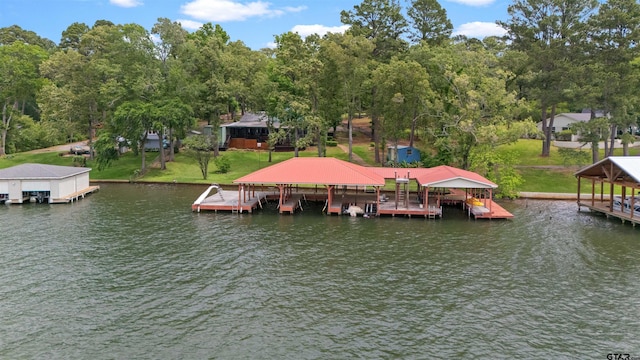 dock area with a water view and boat lift