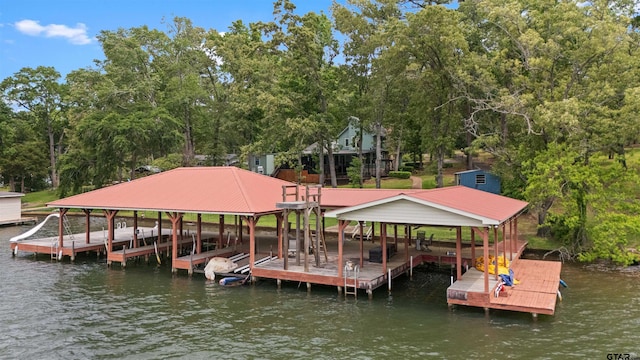 dock area featuring a water view and boat lift
